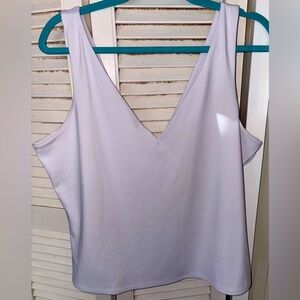 Express body contour white sleeveless double layered white top, maybe worn 1X